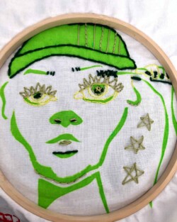 Hand embroidery over screen print